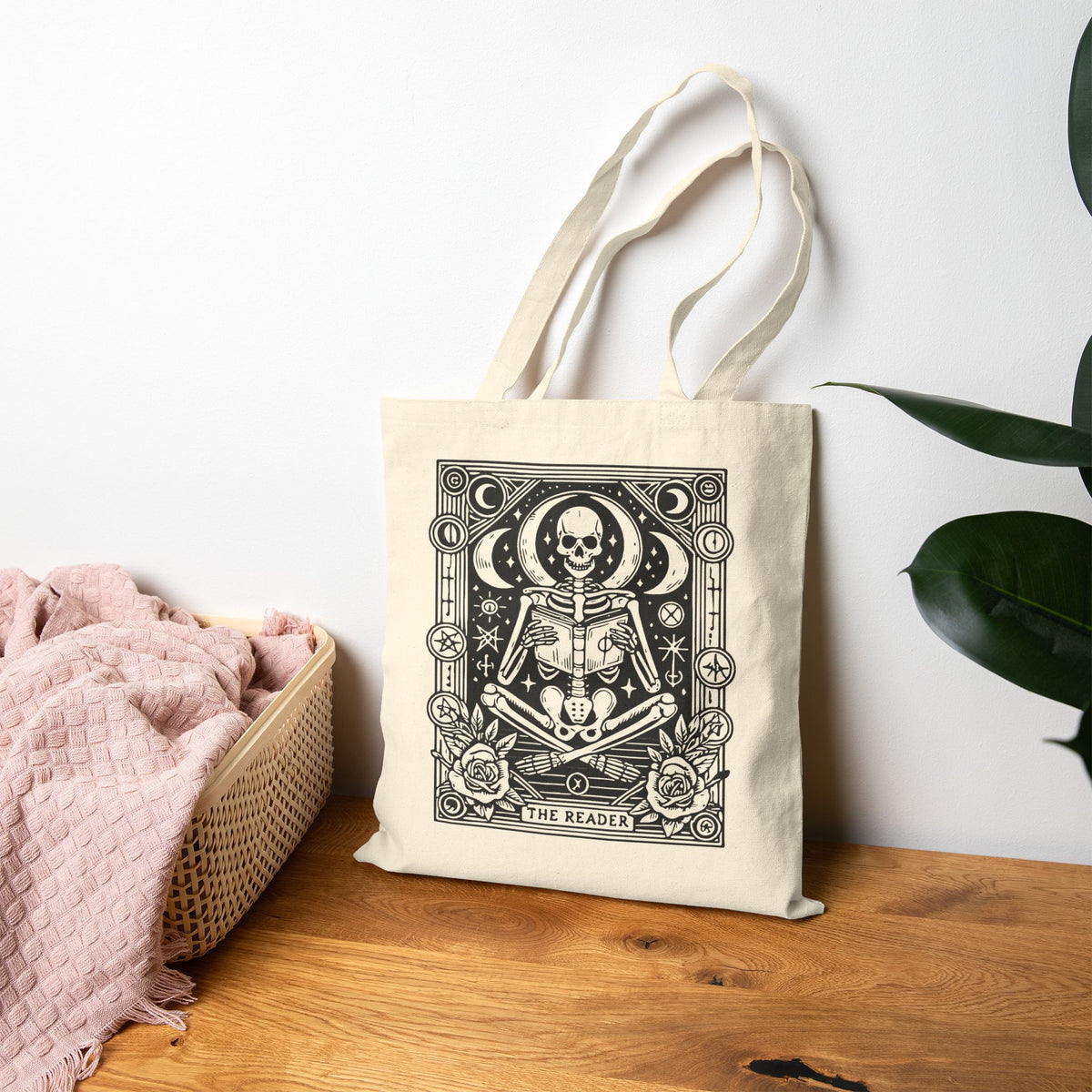 The Reader Skeleton Tarot Design in Black Cotton Canvas Tote
