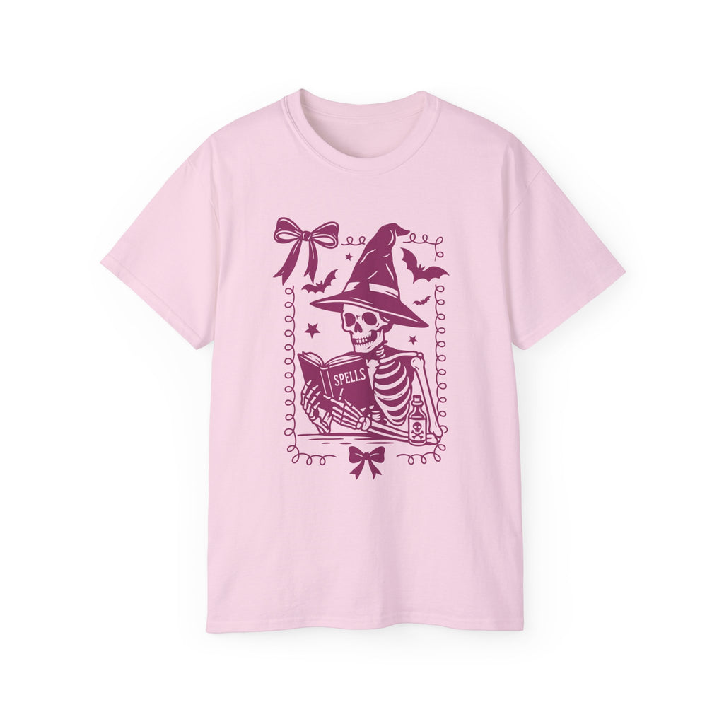 Pink Reading Witch Skeleton Tee — Cute Halloween Aesthetic Graphic T-Shirt