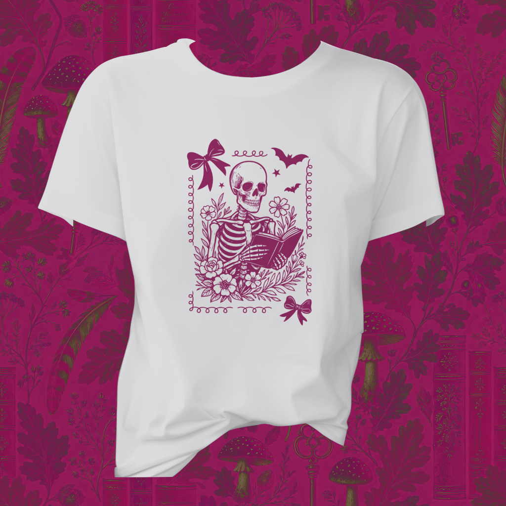 Skeleton Reading Coquette Frame Tee – Floral Skull Book Lover T-Shirt
