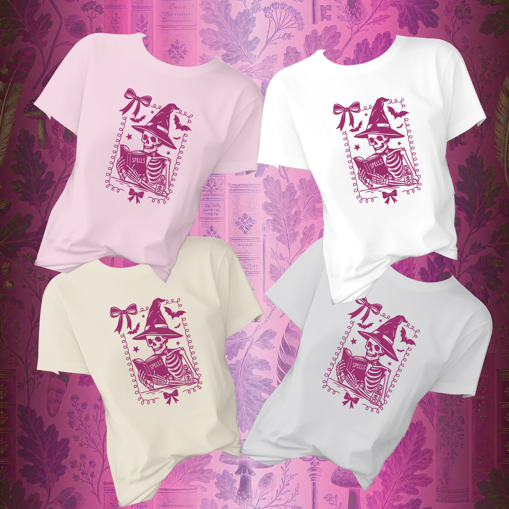 Pink Reading Witch Skeleton Tee — Cute Halloween Aesthetic Graphic T-Shirt