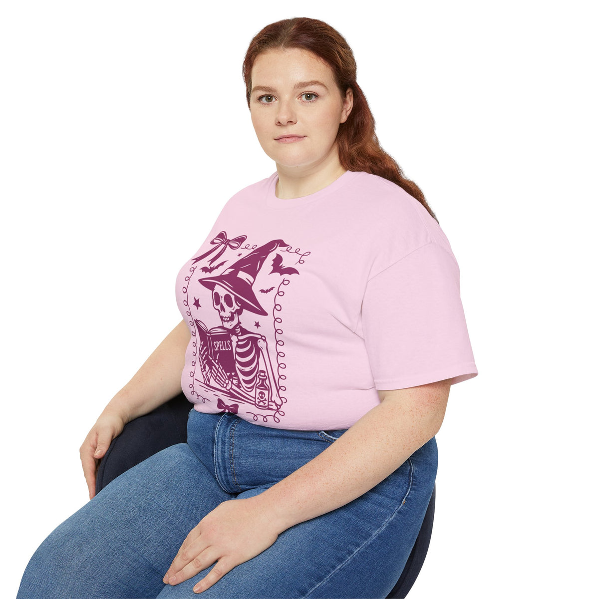 Pink Reading Witch Skeleton Tee — Cute Halloween Aesthetic Graphic T-Shirt