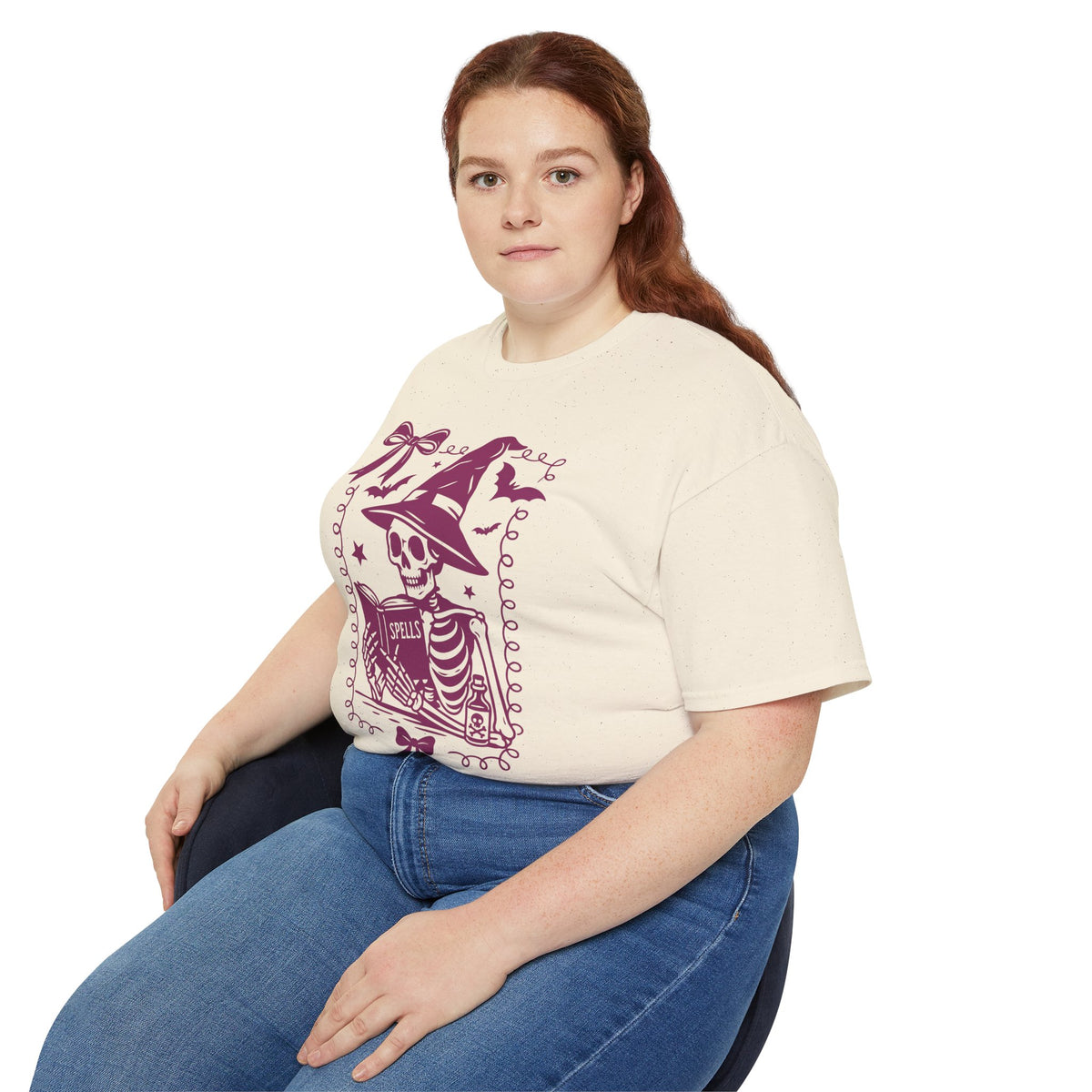 Pink Reading Witch Skeleton Tee — Cute Halloween Aesthetic Graphic T-Shirt
